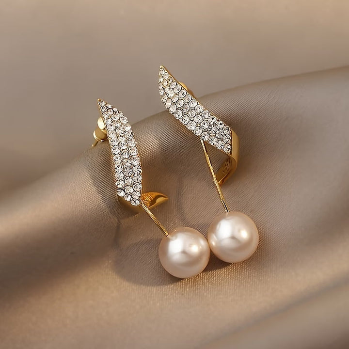 Boucles d'oreilles en perles de cristal et plumes
